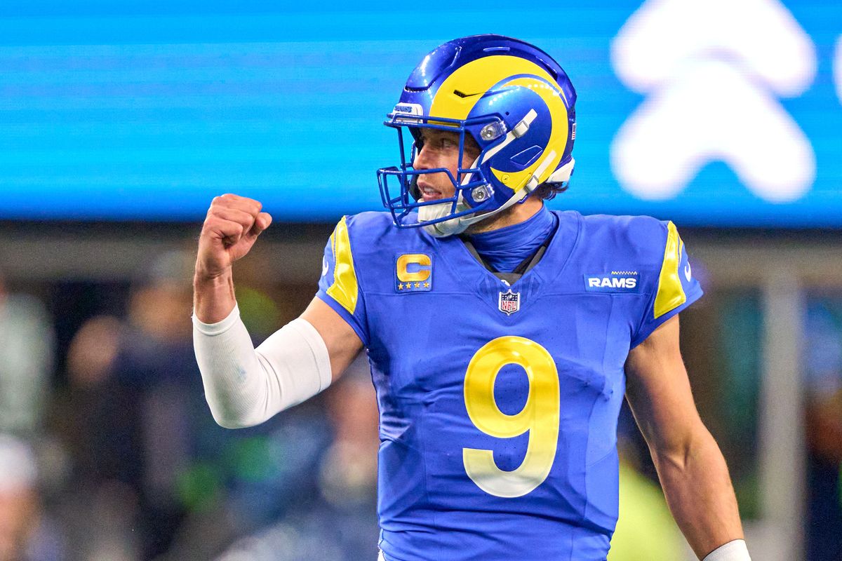Los Angeles Rams quarterback Matthew Stafford (9) celebrates after a play during an NFL football game against the Seattle Seahawks, on Thursday December 18, 2025 in Seattle, Washington.