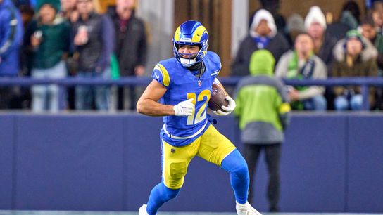 Los Angeles Rams wide receiver Puka Nacua (12) runs with the football during an NFL football game against the Seattle Seahawks, on Thursday December 18, 2025 in Seattle, Washington.