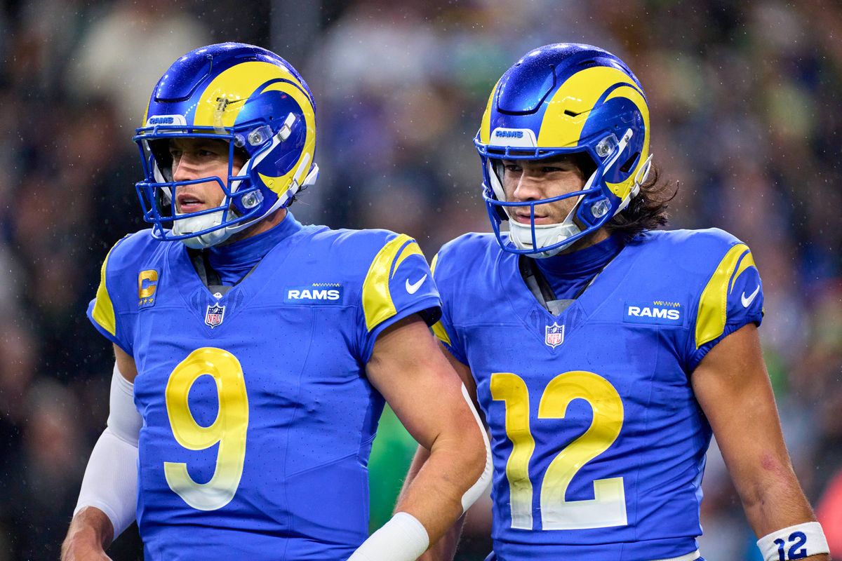 Los Angeles Rams quarterback Matthew Stafford (9) and wide receiver Puka Nacua (12) look on during an NFL football game against the Seattle Seahawks, on Thursday December 18, 2025 in Seattle, Washington.