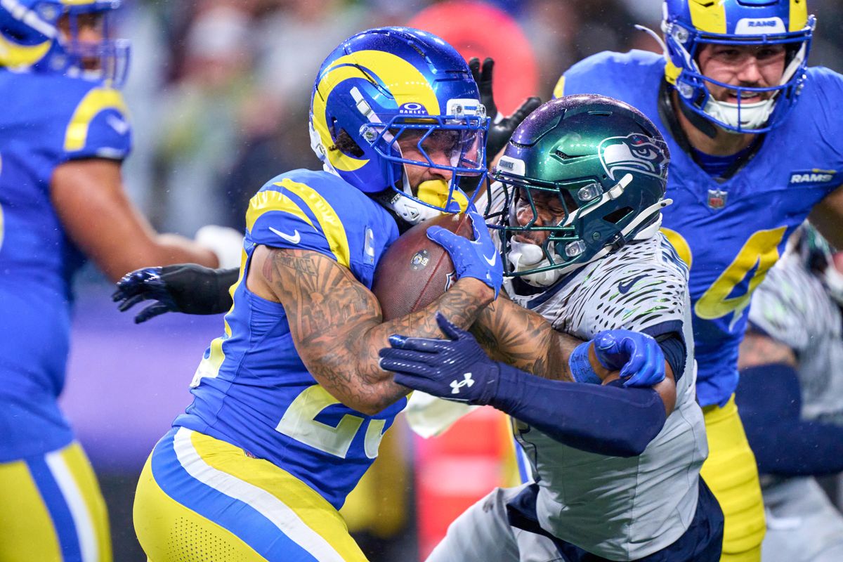 Los Angeles Rams running back Kyren Williams (23) runs with the football during an NFL football game against the Seattle Seahawks, on Thursday December 18, 2025 in Seattle, Washington.