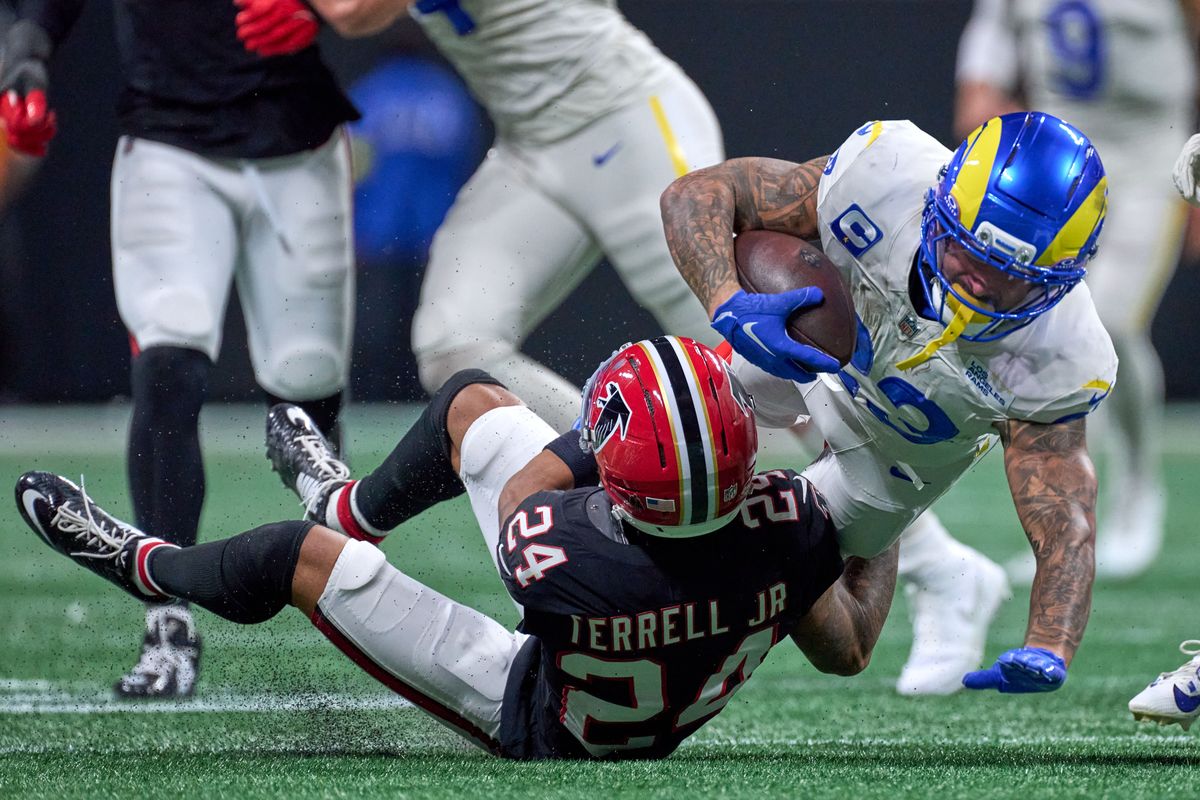 Atlanta Falcons cornerback A.J. Terrell Jr. (24) tackles Los Angeles Rams running back Kyren Williams (23) during a NFL football game against the Los Angeles Rams, on Monday, December 29, 2025 in Atlanta, Geor.       