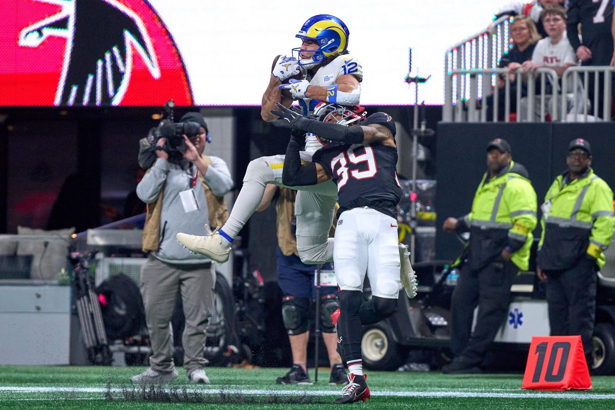 Los Angeles Rams wide receiver Puka Nacua (12) battles with Atlanta Falcons cornerback C.J. Henderson (39) to catch the football during an NFL football game against the Atlanta Falcons, on Monday, December 29, 2025 in Atlanta, Geor.               