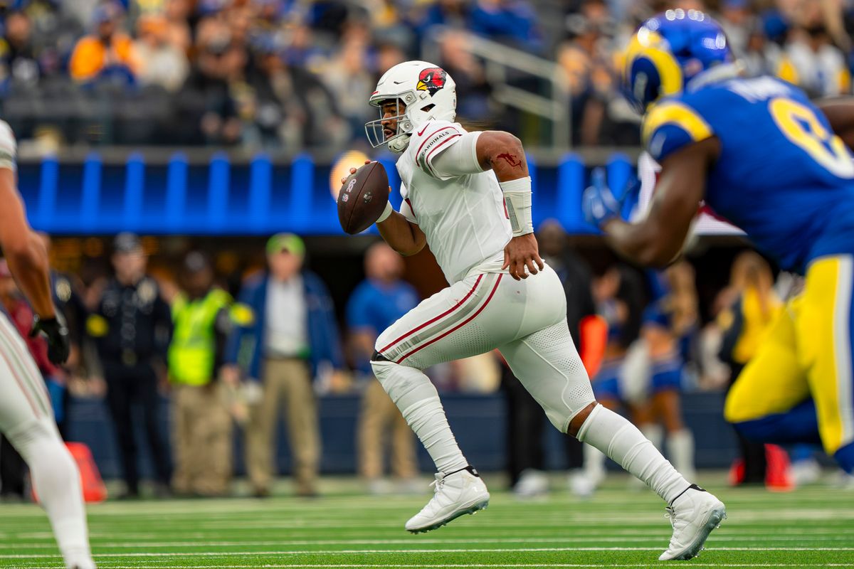 Arizona Cardinals quarterback Jacoby Brisset (7) escaping pressure in the pocket during an NFL football game against the Los Angeles Rams on January 4th, 2026 in Los Angeles, CA.