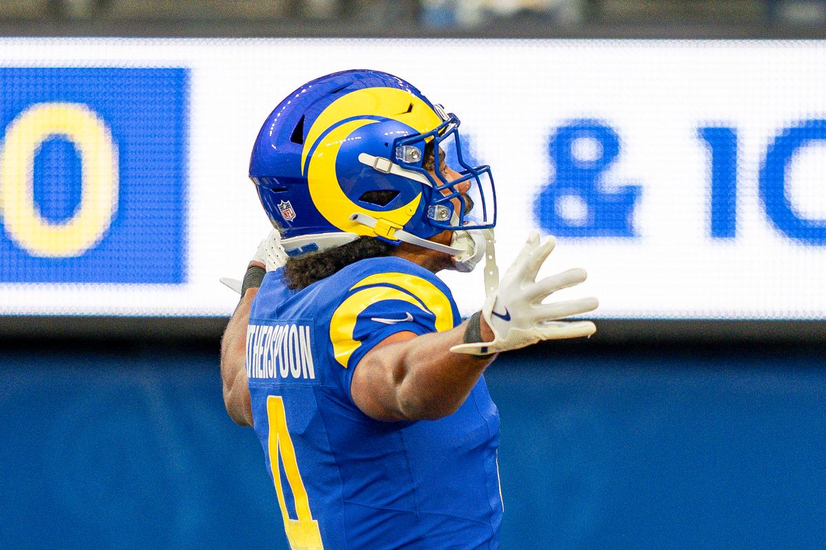 Los Angeles Rams cornerback Ahkello Witherspoon (4) celebrates an interception during an NFL football game against the Arizona Cardinals on January 4th, 2026 in Los Angeles, CA.