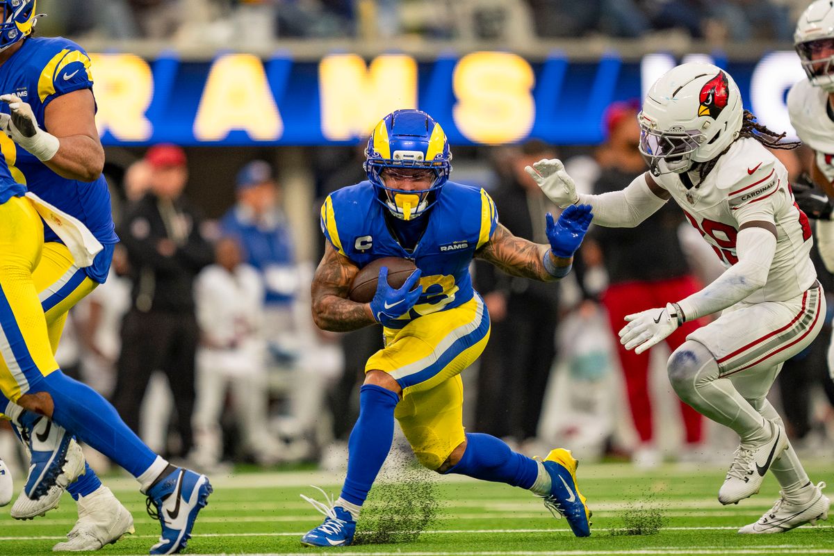Los Angeles Rams running back Kyren Williams (23) runs through defenders during an NFL football game against the Arizona Cardinals on January 4th, 2026 in Los Angeles, CA.