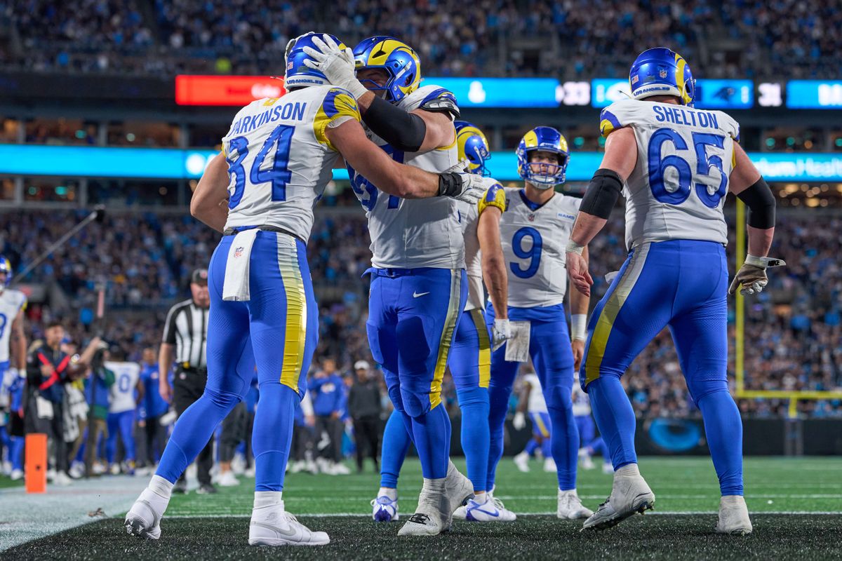 Los Angeles Rams tight end Colby Parkinson #84 celebrates with teammates after scoring the winning touchdown in the fourth quarter during an NFL Wildcard football game against the Carolina Panthers, on Saturday, January 10, 2026 in Charlotte, North Carolina.             
