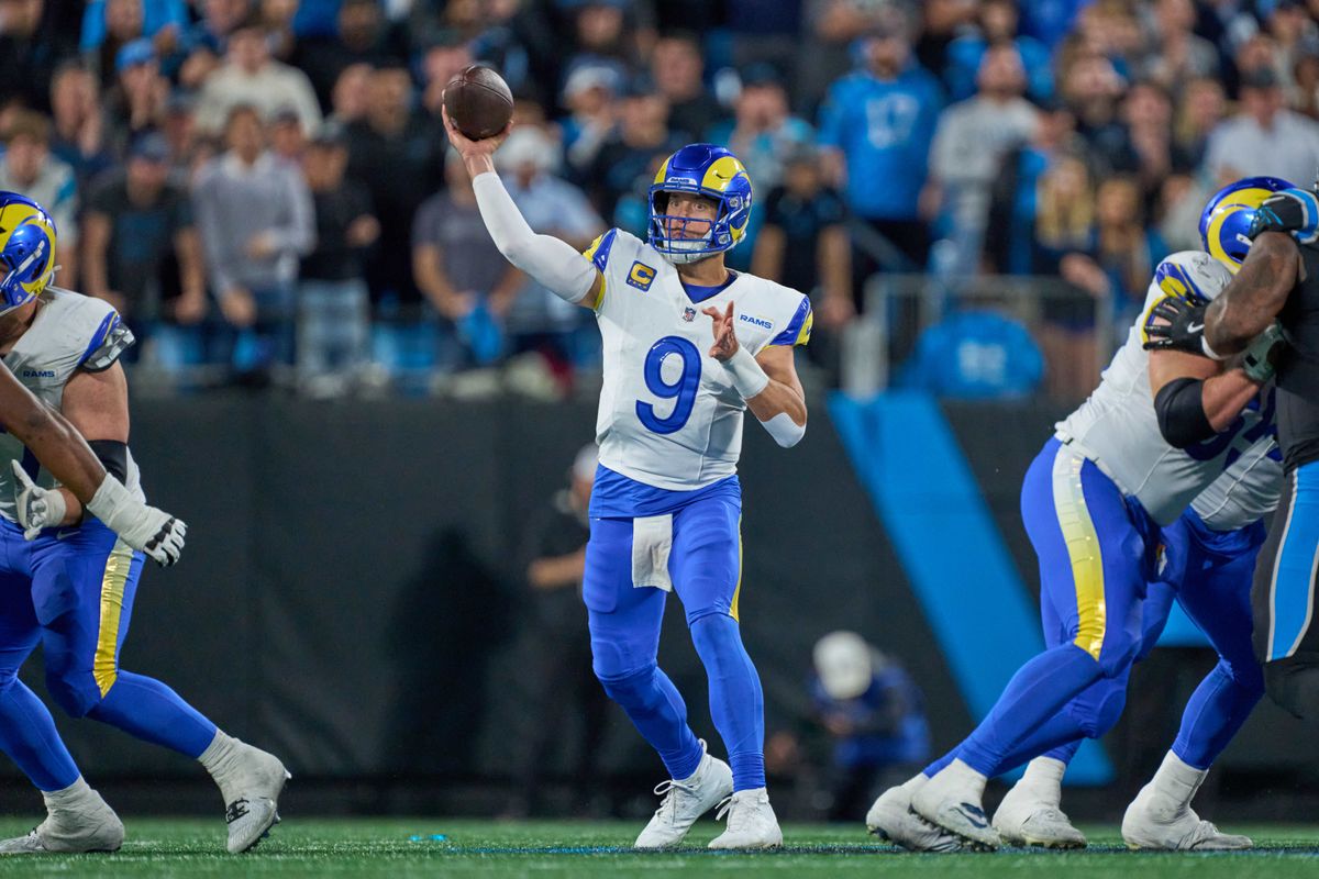 Los Angeles Rams quarterback Matthew Stafford #9 throws the football during an NFL Wildcard football game against the Carolina Panthers, on Saturday, January 10, 2026 in Charlotte, North Carolina.      