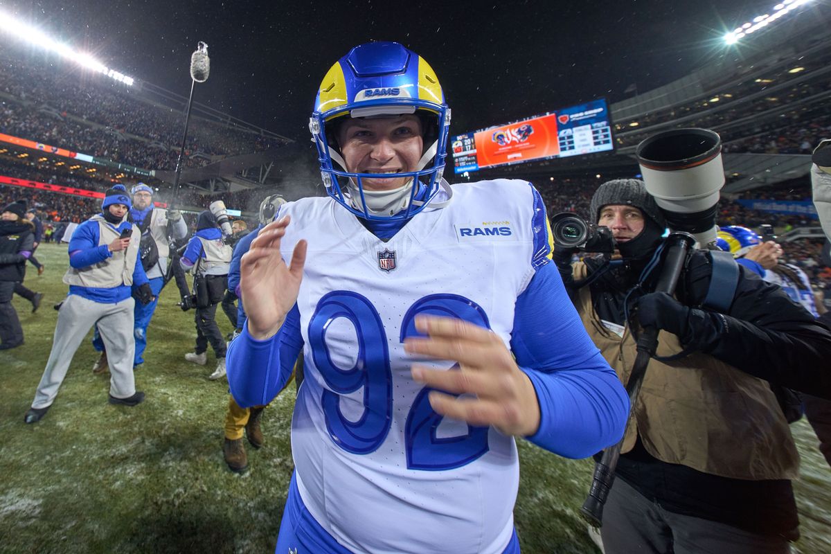 Los Angeles Rams safety Kam Curl #3 celebrates with teammates after making an interception in the fourth quarter during a NFL Divisional football game against the Chicago Bears, on Sunday, January 18, 2026 in Chicago, Illinois.  