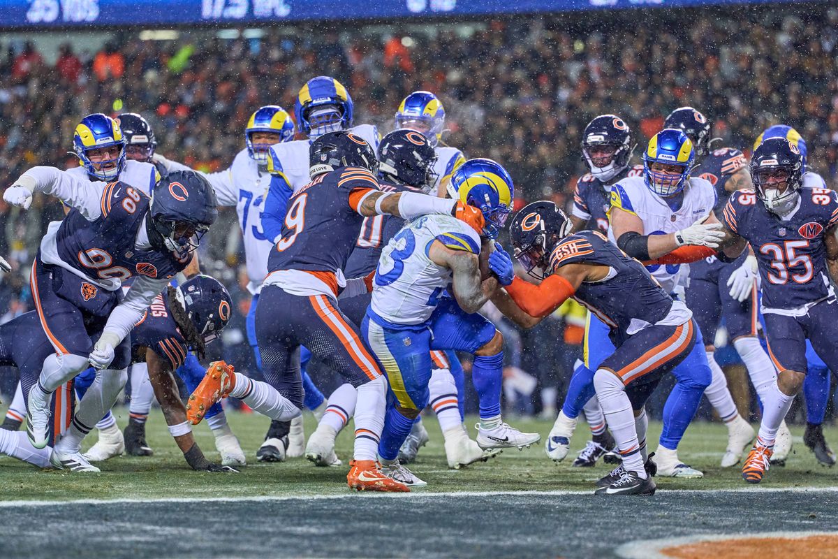 Los Angeles Rams running back Kyren Williams #23 runs with the football and scores a touchdown in the first quarter during an NFL Divisional football game against the Chicago Bears, on Sunday, January 18, 2026 in Chicago, Illinois.                              