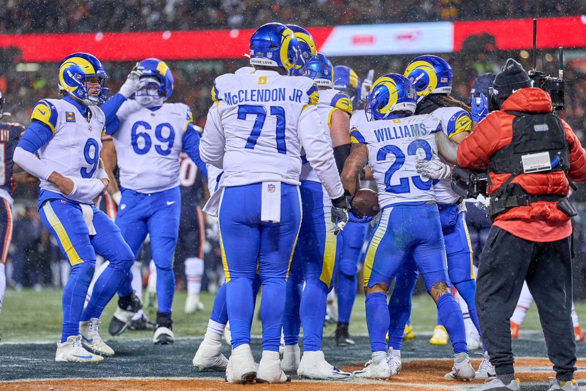 Los Angeles Rams running back Kyren Williams #23 celebrates with teammates after scoring a touchdown in the first quarter during an NFL Divisional football game against the Chicago Bears, on Sunday, January 18, 2026 in Chicago, Illinois.                              