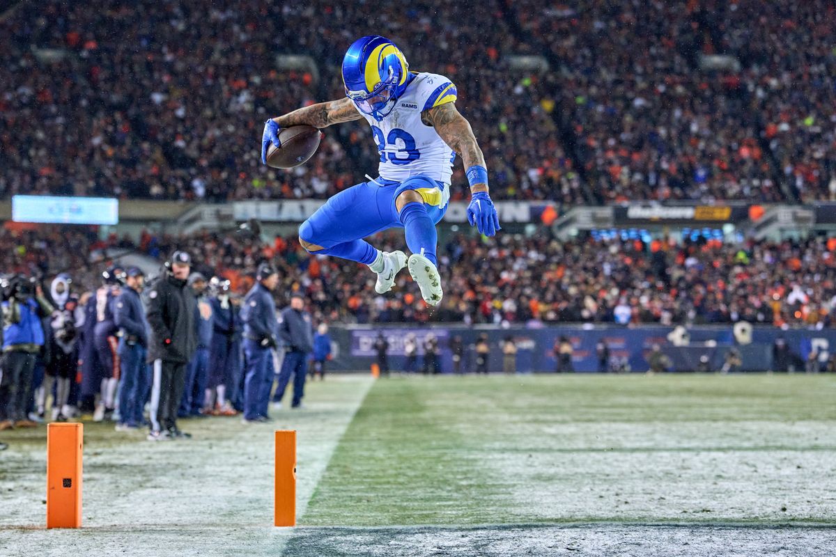 Los Angeles Rams running back Kyren Williams #23 celebrates with teammates after scoring a touchdown in the fourth quarter during an NFL Divisional football game against the Chicago Bears, on Sunday, January 18, 2026 in Chicago, Illinois.                              