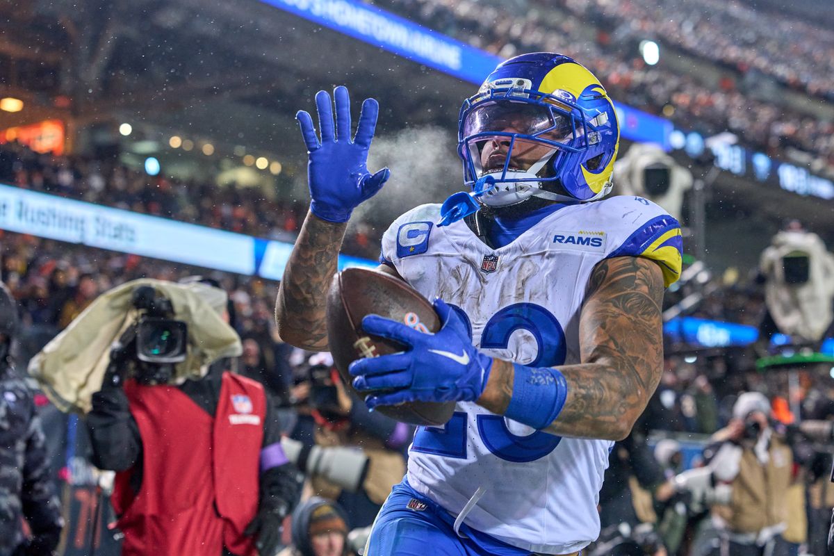 Los Angeles Rams running back Kyren Williams #23 celebrates with teammates after scoring a touchdown in the fourth quarter during an NFL Divisional football game against the Chicago Bears, on Sunday, January 18, 2026 in Chicago, Illinois.                          