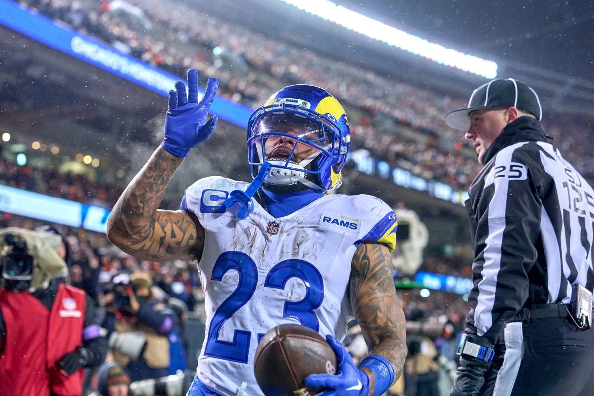 Los Angeles Rams running back Kyren Williams #23 celebrates with teammates after scoring a touchdown in the fourth quarter during an NFL Divisional football game against the Chicago Bears, on Sunday, January 18, 2026 in Chicago, Illinois.                          