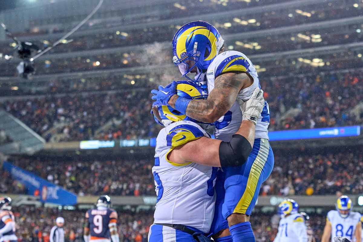 Los Angeles Rams running back Kyren Williams #23 celebrates with teammates after scoring a touchdown in the fourth quarter during an NFL Divisional football game against the Chicago Bears, on Sunday, January 18, 2026 in Chicago, Illinois.                          