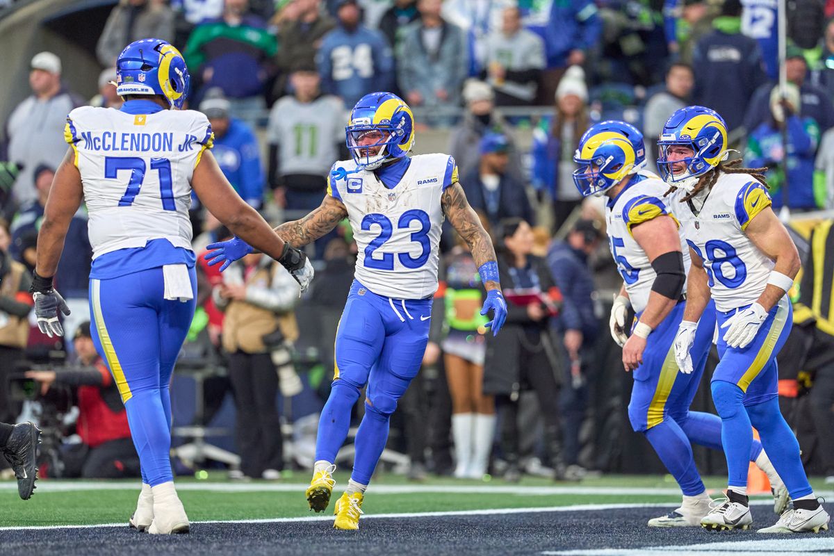 Los Angeles Rams running back Kyren Williams #23 celebrates with teammate after scoring a touchdown during the NFC Championship Game against the Seattle Seahawks, on Sunday January 25, 2026 in Seattle, Washington.  