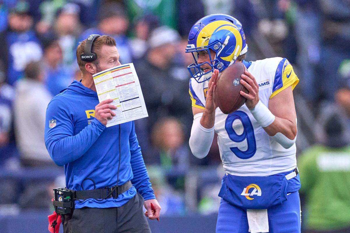 Los Angeles Rams head coach Sean McVay and quarterback Matthew Stafford #9 chat during the NFC Championship Game against the Seattle Seahawks, on Sunday January 25, 2026 in Seattle, Washington.  