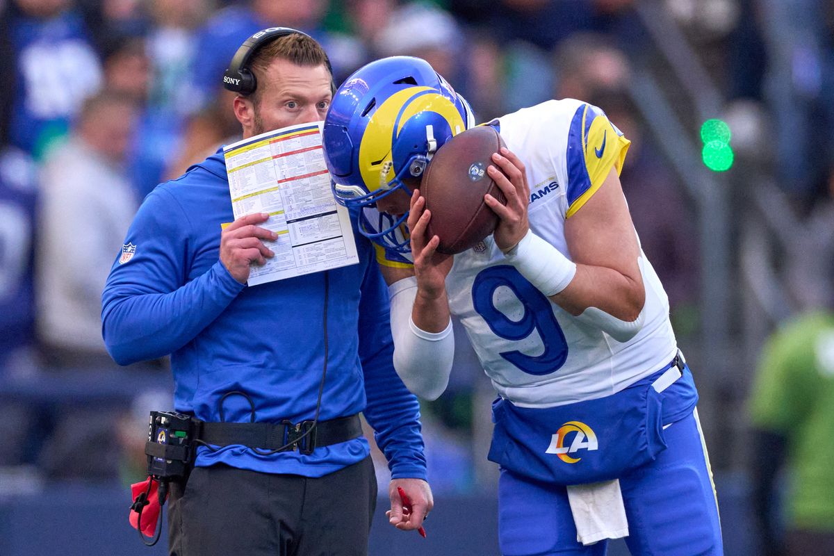Los Angeles Rams head coach Sean McVay and quarterback Matthew Stafford #9 chat during the NFC Championship Game against the Seattle Seahawks, on Sunday January 25, 2026 in Seattle, Washington.  