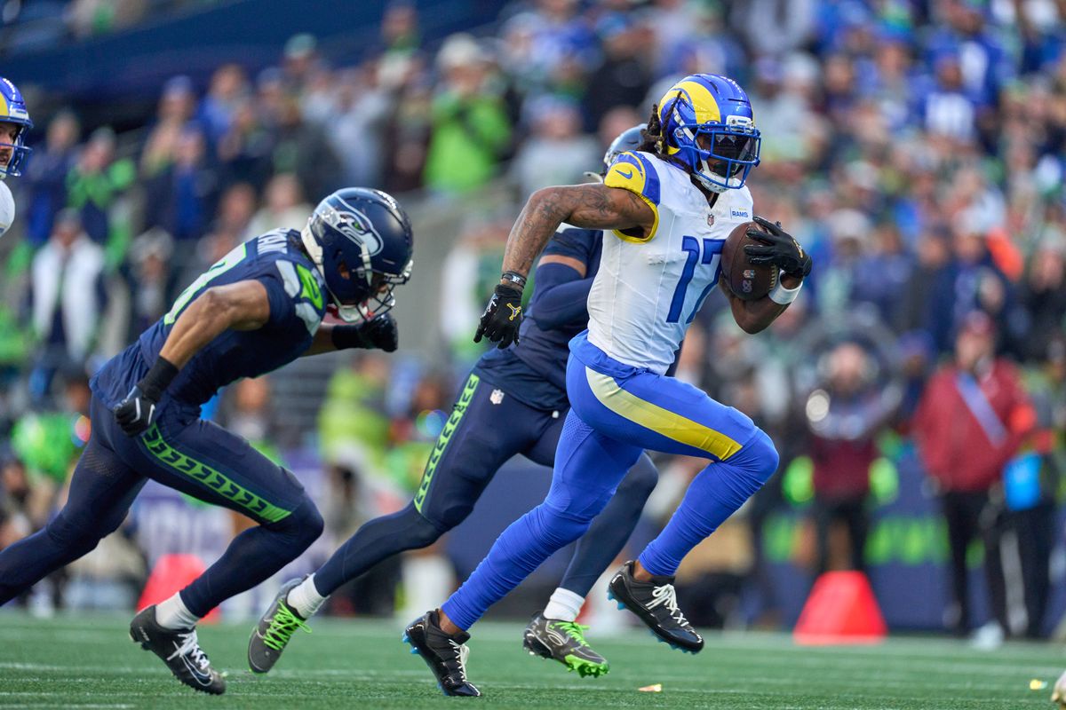 Los Angeles Rams wide receiver Davante Adams #17 runs with the football during the NFC Championship Game against the Seattle Seahawks, on Sunday January 25, 2026 in Seattle, Washington.  