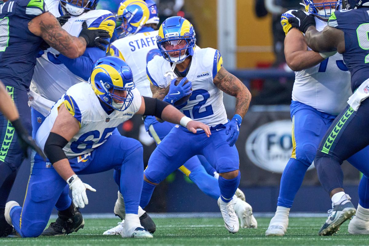 Los Angeles Rams running back Blake Corum #22 runs with the football during NFC Championship Game against the Seattle Seahawks, on Sunday January 25, 2026 in Seattle, Washington.  