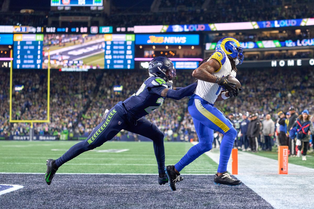 Los Angeles Rams wide receiver Davante Adams #17 catches  the football and scores a touchdown during the NFC Championship Game against the Seattle Seahawks, on Sunday January 25, 2026 in Seattle, Washington.  