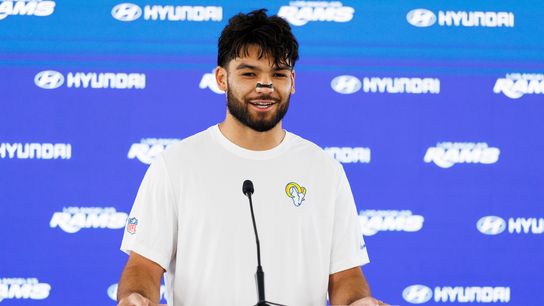 Puka Nacua #12 of the Los Angeles Rams talks with members of the media after an OTA offseason workout at Rams Village at Warner Center on May 26, 2026 in Woodland Hills, California. 