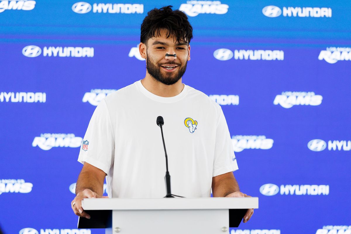 Puka Nacua #12 of the Los Angeles Rams talks with members of the media after an OTA offseason workout at Rams Village at Warner Center on May 26, 2026 in Woodland Hills, California. 