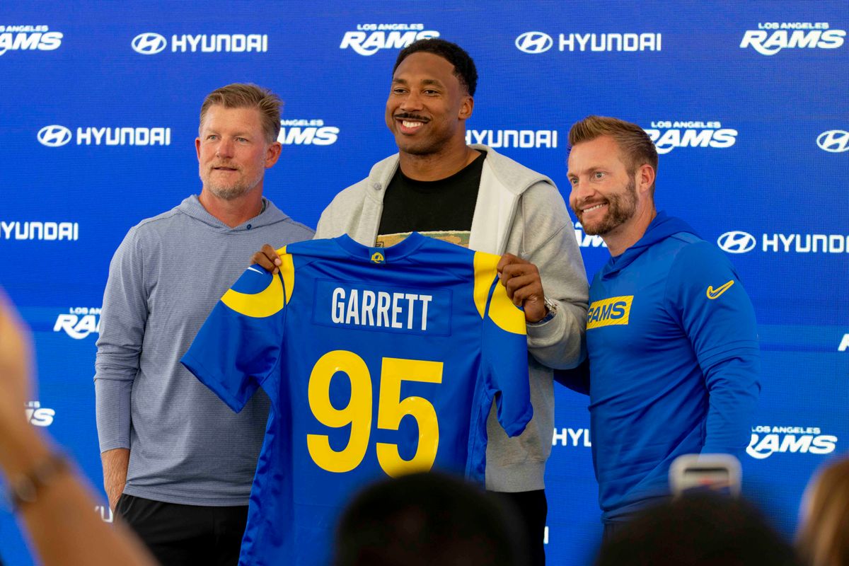 Los Angeles Rams DE Myles Garrett, GM Les Snead, and head coach Sean McVay pose for a picture at Rams Village at Warner Center on June 2nd, 2026 in Woodland Hills, California. Los Angeles Rams DE Myles Garrett, GM Les Snead, and head coach Sean McVay pose for a picture at Rams Village at Warner Center on June 2nd, 2026 in Woodland Hills, California.