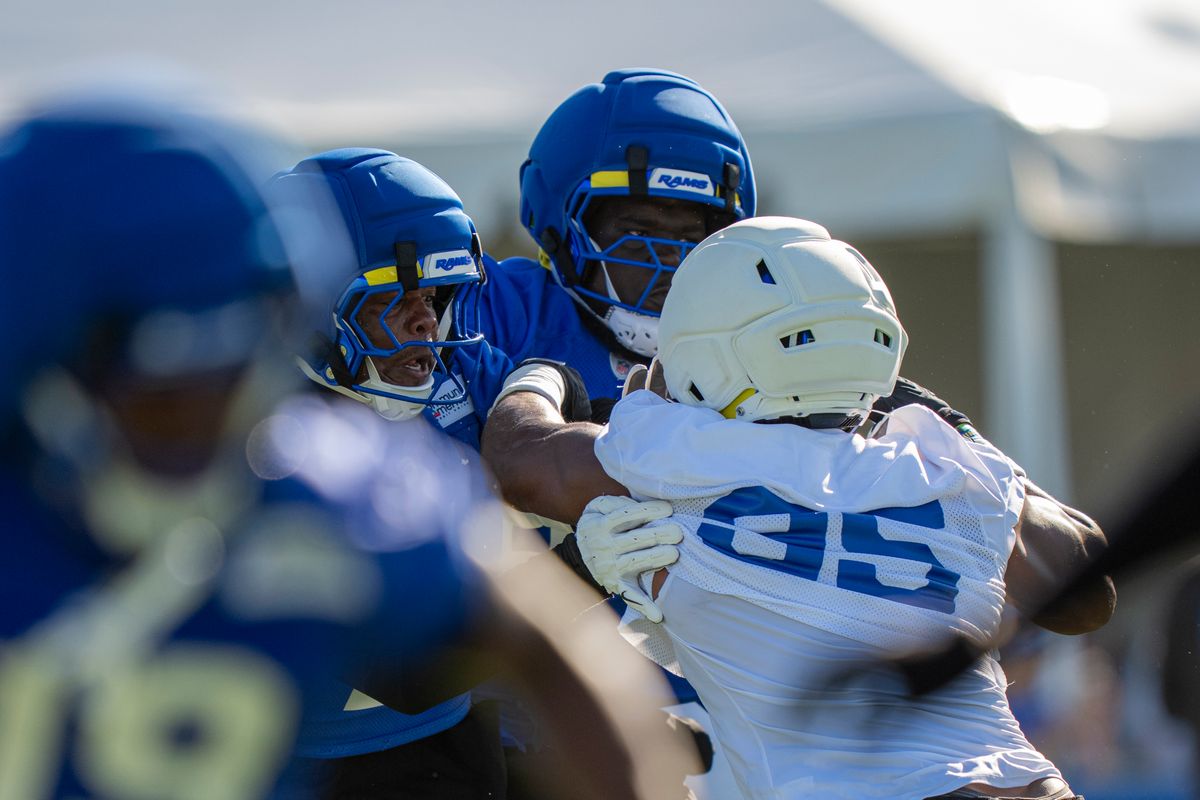 Los Angeles Rams defensive lineman Myles Garrett (95) being double-teamed during Rams training camp at the Loyola Marymount University on Monday, July 27th in Westchester, CA.