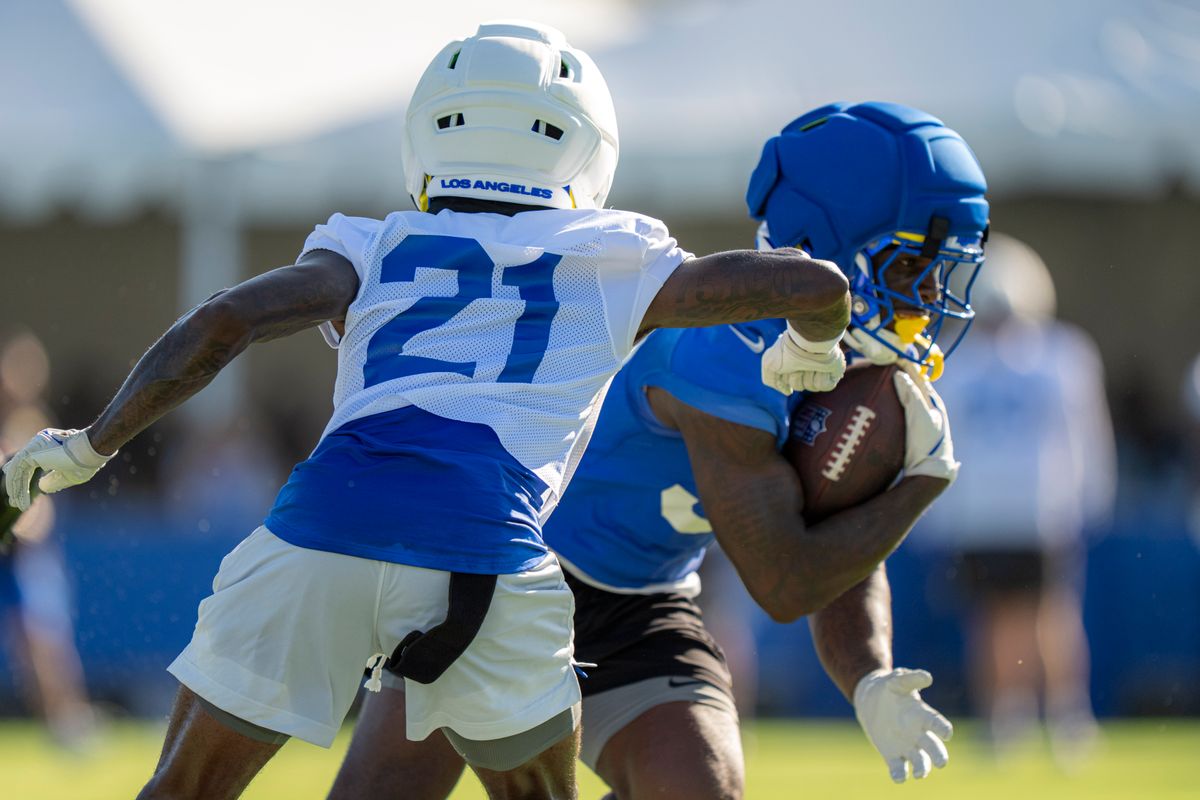 Los Angeles Rams cornerback Cam Lampkin (21) attempting to punch the ball during Rams training camp at the Loyola Marymount University on Monday, July 27th in Westchester, CA.
