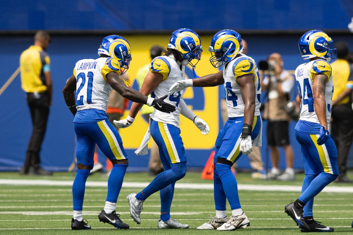 Los Angeles Rams cornerback Cam Lampkin (21) daps up with teammates during an NFL preseason game between the New Orleans Saints and Los Angeles Rams on Saturday, August 22, 2026 at SoFi Stadium in Inglewood, California. Los Angeles Rams cornerback Cam Lampkin (21) daps up with teammates during an NFL preseason game between the New Orleans Saints and Los Angeles Rams on Saturday, August 22, 2026 at SoFi Stadium in Inglewood, California.