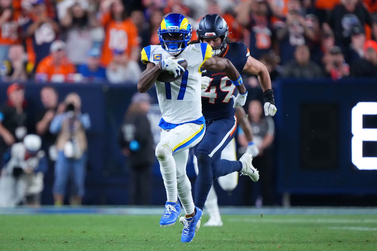 Los Angeles Rams wide receiver Davante Adams #17 runs with the football during an NFL football game against the Denver Broncos, on Sunday September 27, 2026 in Denver, CO. Los Angeles Rams wide receiver Davante Adams #17 runs with the football during an NFL football game against the Denver Broncos, on Sunday September 27, 2026 in Denver, CO.