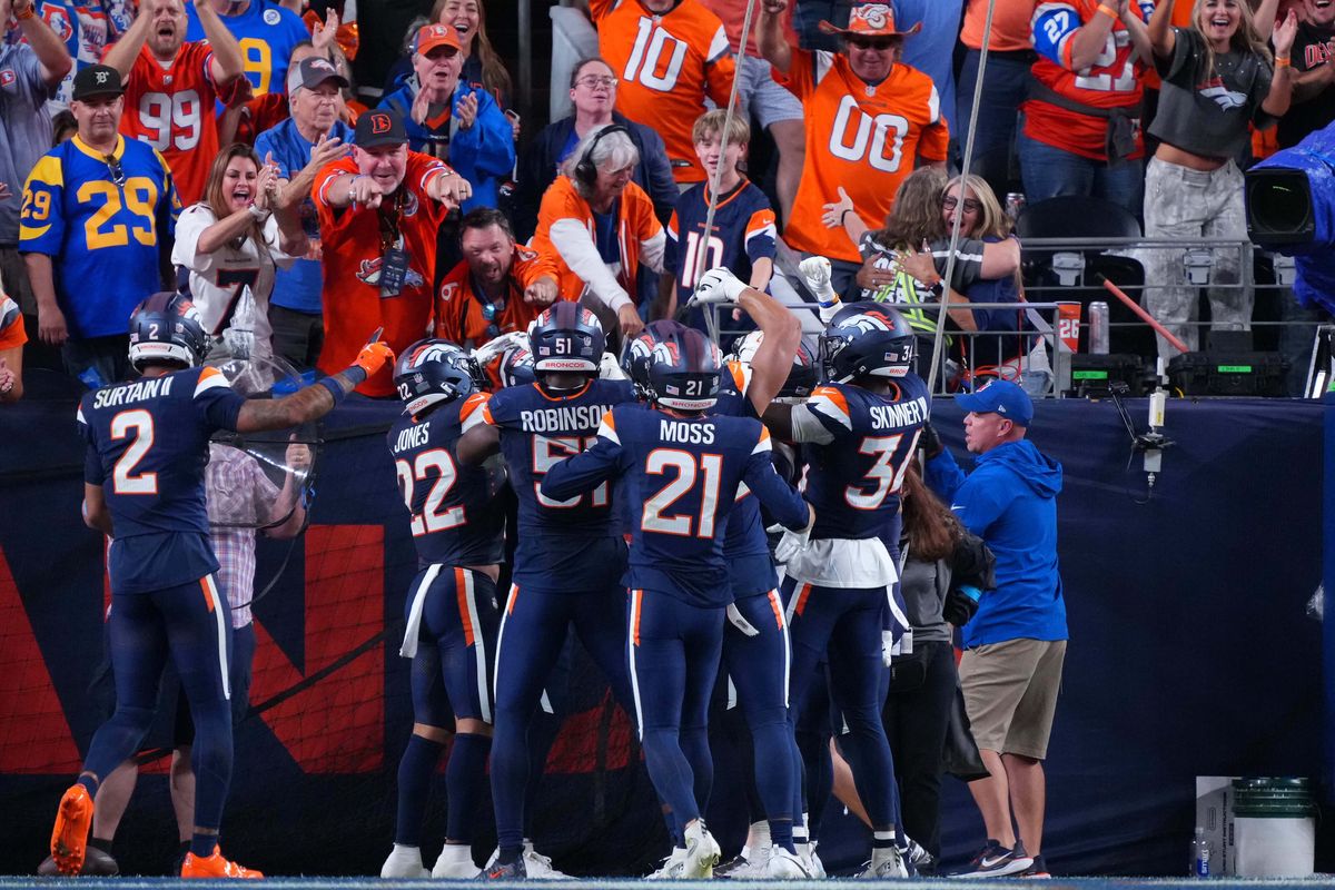 Denver Broncos safety Talanoa Hufanga #9 celebrates with fans after intercepting the football for a pick six during an NFL football game against the Los Angeles Rams, on Sunday September 27, 2026 in Denver, CO. Denver Broncos safety Talanoa Hufanga #9 celebrates with fans after intercepting the football for a pick six during an NFL football game against the Los Angeles Rams, on Sunday September 27, 2026 in Denver, CO.
