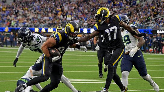 Los Angeles Rams tight end Colby Parkinson (84) scores a touchdown during the second half against the Seattle Seahawks at SoFi Stadium.