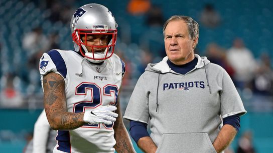 New England Patriots strong safety Patrick Chung (23) talks with New England Patriots head coach Bill Belichick prior to the game against the Miami Dolphins at Hard Rock Stadium. 