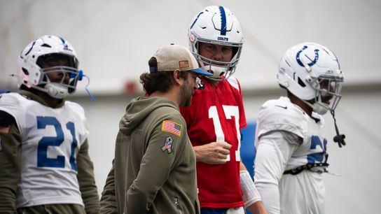 Indianapolis Colts quarterback Philip Rivers (17) talks with quarterbacks coach Cam Turner on Wednesday, Dec. 10, 2025, during practice at the Colts training facility in Indianapolis.