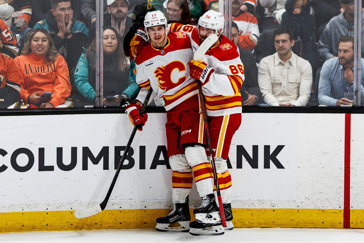 Yegor Sharangovich #17 of the Calgary Flames celebrates with Joel Farabee #86 of the Calgary Flames after scoring a goal during an NHL game against the Anaheim Ducks on October 13, 2026 at Honda Center in Anaheim, California. Yegor Sharangovich #17 of the Calgary Flames celebrates with Joel Farabee #86 of the Calgary Flames after scoring a goal during an NHL game against the Anaheim Ducks on October 13, 2026 at Honda Center in Anaheim, California.