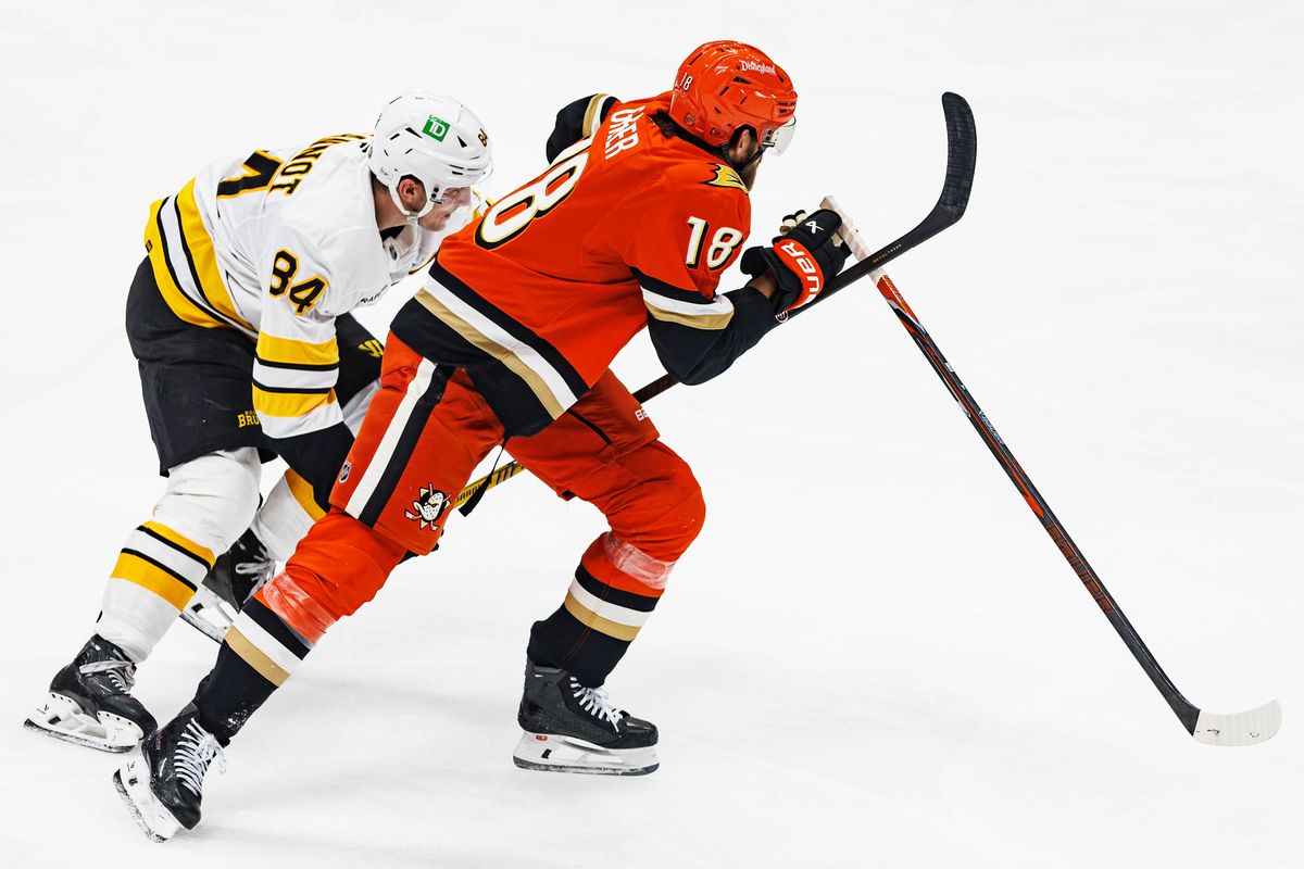 Tanner Jeannot #84 of the Boston Bruins hits the stick of AJ Greer #18 of the Anaheim Ducks during an NHL regular season game against the Anaheim Ducks on October 16, 2026 at Honda Center in Anaheim, California. Tanner Jeannot #84 of the Boston Bruins hits the stick of AJ Greer #18 of the Anaheim Ducks during an NHL regular season game against the Anaheim Ducks on October 16, 2026 at Honda Center in Anaheim, California.