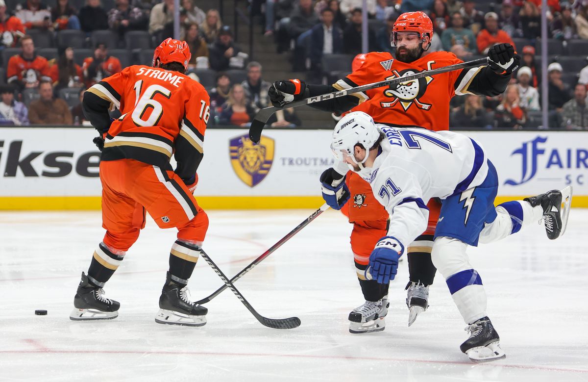 Anaheim Ducks D (7) Radko Gudas and C (16) Ryan Strome battle for control of the loose puck against the Tampa Bay Lightning on January 5, 2025at the Honda Center in Anaheim, CA. Anaheim Ducks D (7) Radko Gudas and C (16) Ryan Strome battle for control of the loose puck against the Tampa Bay Lightning on January 5, 2025at the Honda Center in Anaheim, CA.