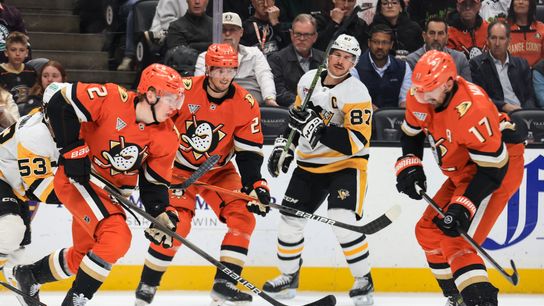 Anaheim Ducks defenseman Jackson LaCombe (2) skates with the puck during the NHL game against the Pittsburgh Penguins, Thursday January 23rd, 2025 at the Honda Center in Anaheim, Calif.