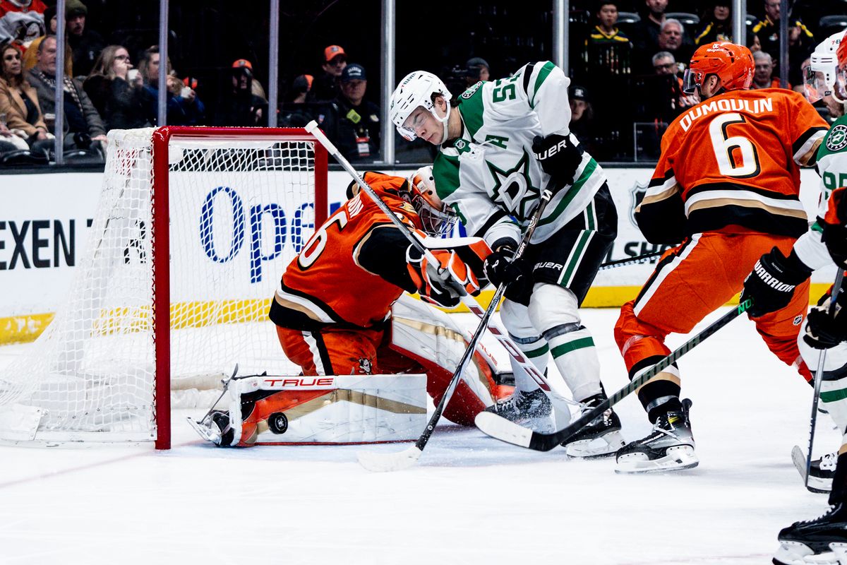 Anaheim Ducks G John Gibson (36) saves a goal while the defender slams into him in a game against the Dallas Stars, Tuesday February 4, 2025 at the Honda Center in Anaheim, Calif. Anaheim Ducks G John Gibson (36) saves a goal while the defender slams into him in a game against the Dallas Stars, Tuesday February 4, 2025 at the Honda Center in Anaheim, Calif.