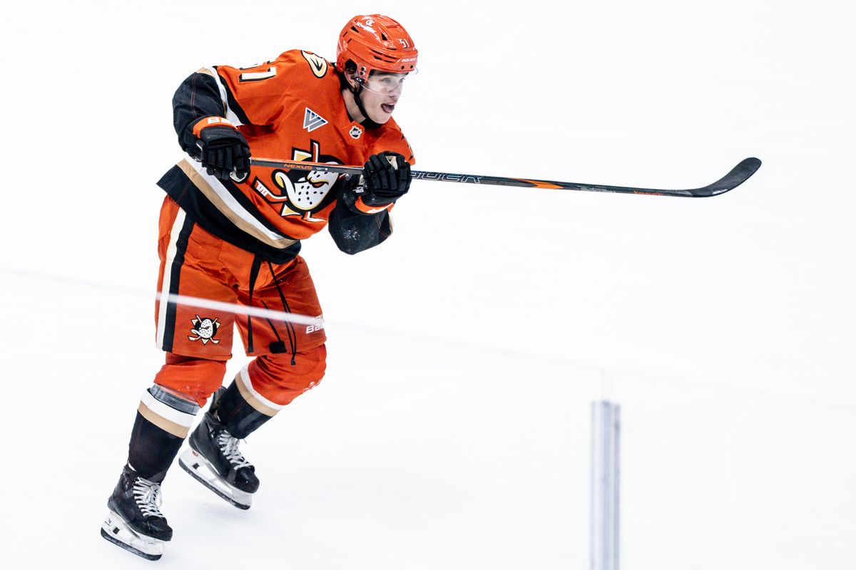 Anaheim Ducks D Olen Zellweger (51) hits the puck down the ice against the Calgary Flames Wednesday April 9th, 2025 at Honda Center in Anaheim, Calif. Anaheim Ducks D Olen Zellweger (51) hits the puck down the ice against the Calgary Flames Wednesday April 9th, 2025 at Honda Center in Anaheim, Calif.