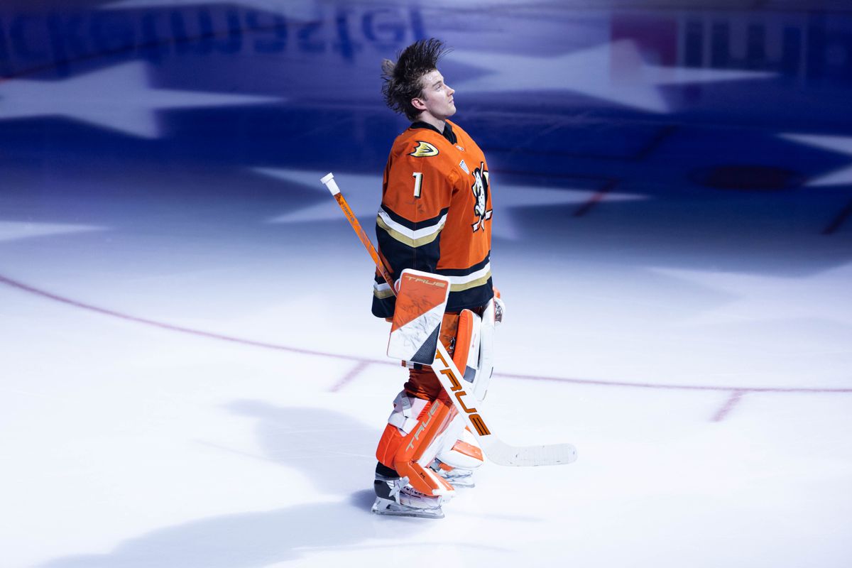 Anaheim Ducks G Lukas Dostal (1) flips his hair during the national anthem in an NHL game against the Boston Bruins on November 19, 2025 in Anaheim, Calif.