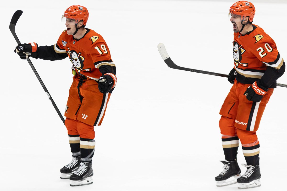 Anaheim Ducks R Troy Terry (19) and L Chris Kreider (20) celebrates after the game winning goal during an NHL game against the Boston Bruins on November 19, 2025 in Anaheim, Calif.