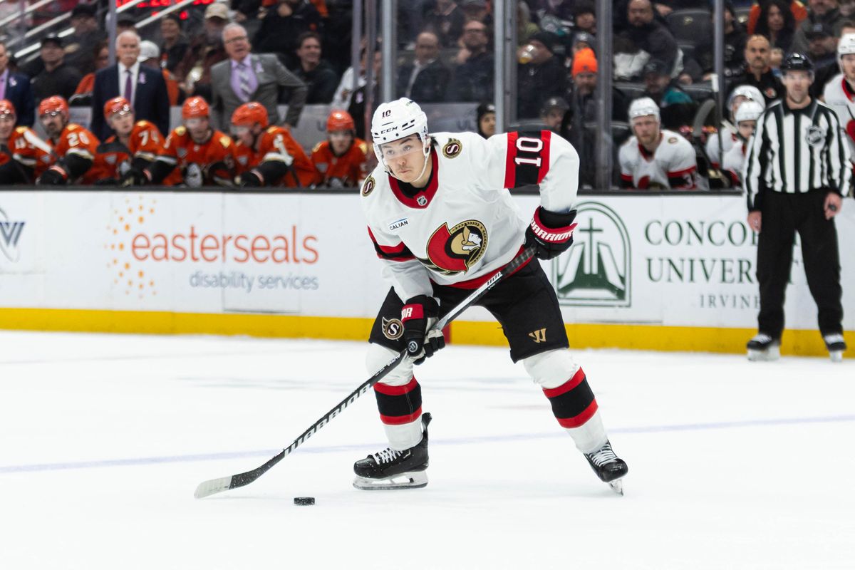 Ottawa Senators D Jordan Spence (10) looks to pass the puck during an NHL game against the Anaheim Ducks on November 20, 2025 in Anaheim, Calif.