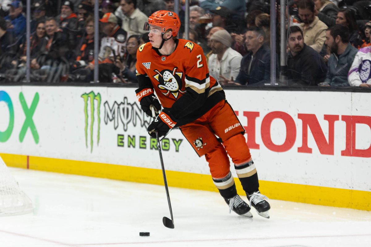 Anaheim Ducks D Jackson LaCombe (2) skates up with the puck during an NHL game against the Ottawa Senators on November 20, 2025 in Anaheim, Calif.