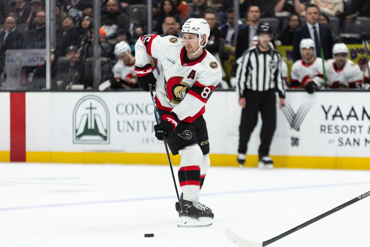 Ottawa Senators D Jake Sanderson (85) looks to pass the puck during an NHL game against the Anaheim Ducks on November 20, 2025 in Anaheim, Calif.