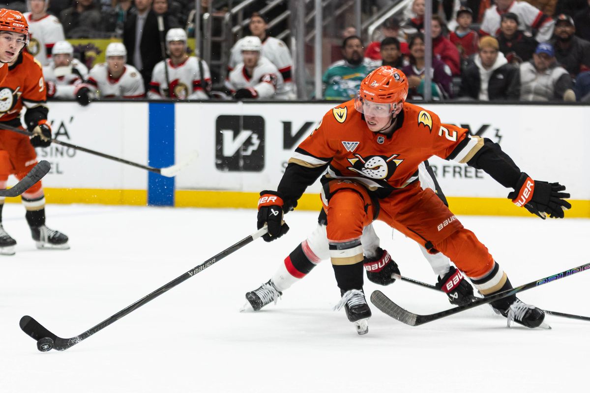 Anaheim Ducks D Jackson LaCombe (2) attempts to defend the puck during an NHL game against the Ottawa Senators on November 20, 2025 in Anaheim, Calif.