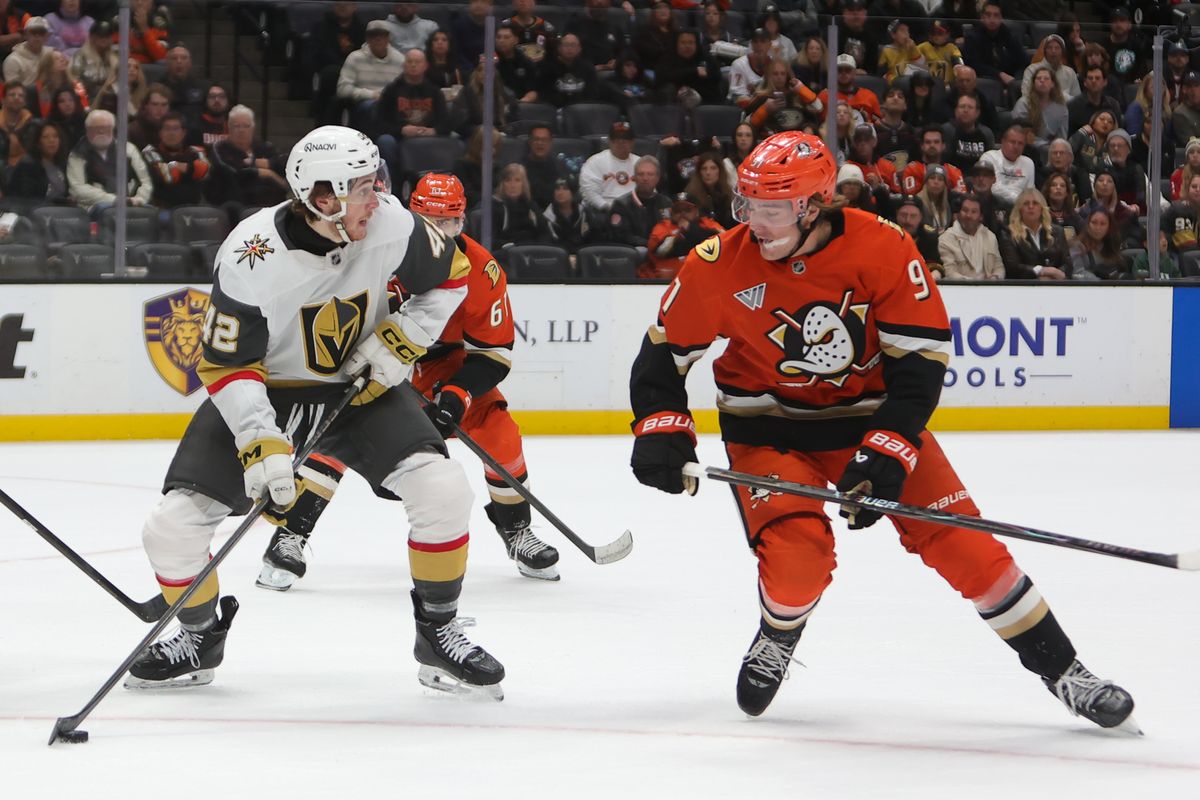 #42 LW Braeden Bowman of the Vegas Golden Knights skates with the puck against #91 C Leo Carlsson of the Anaheim Ducks during an NHL game against the Las Vegas Golden Knights on November 22, 2025 in Anaheim, Calif.