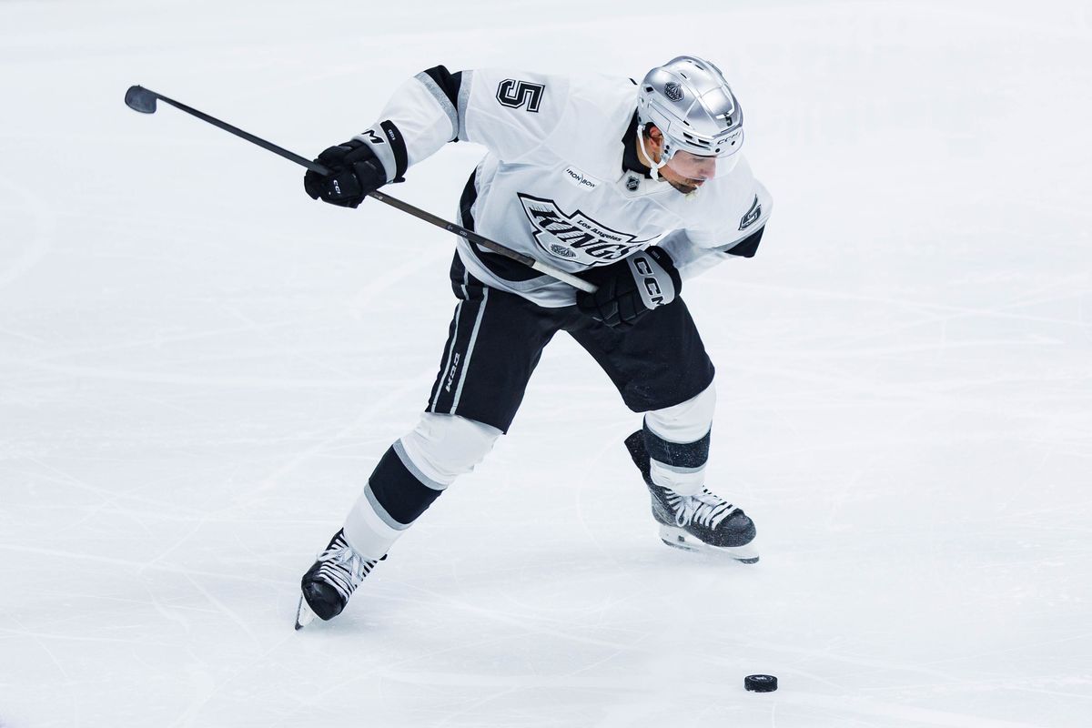 Los Angeles Kings defense Cody Ceci (5) attempts to shoot the puck during an NHL game against the Anaheim Ducks on November 28, 2025 in Anaheim, Calif.