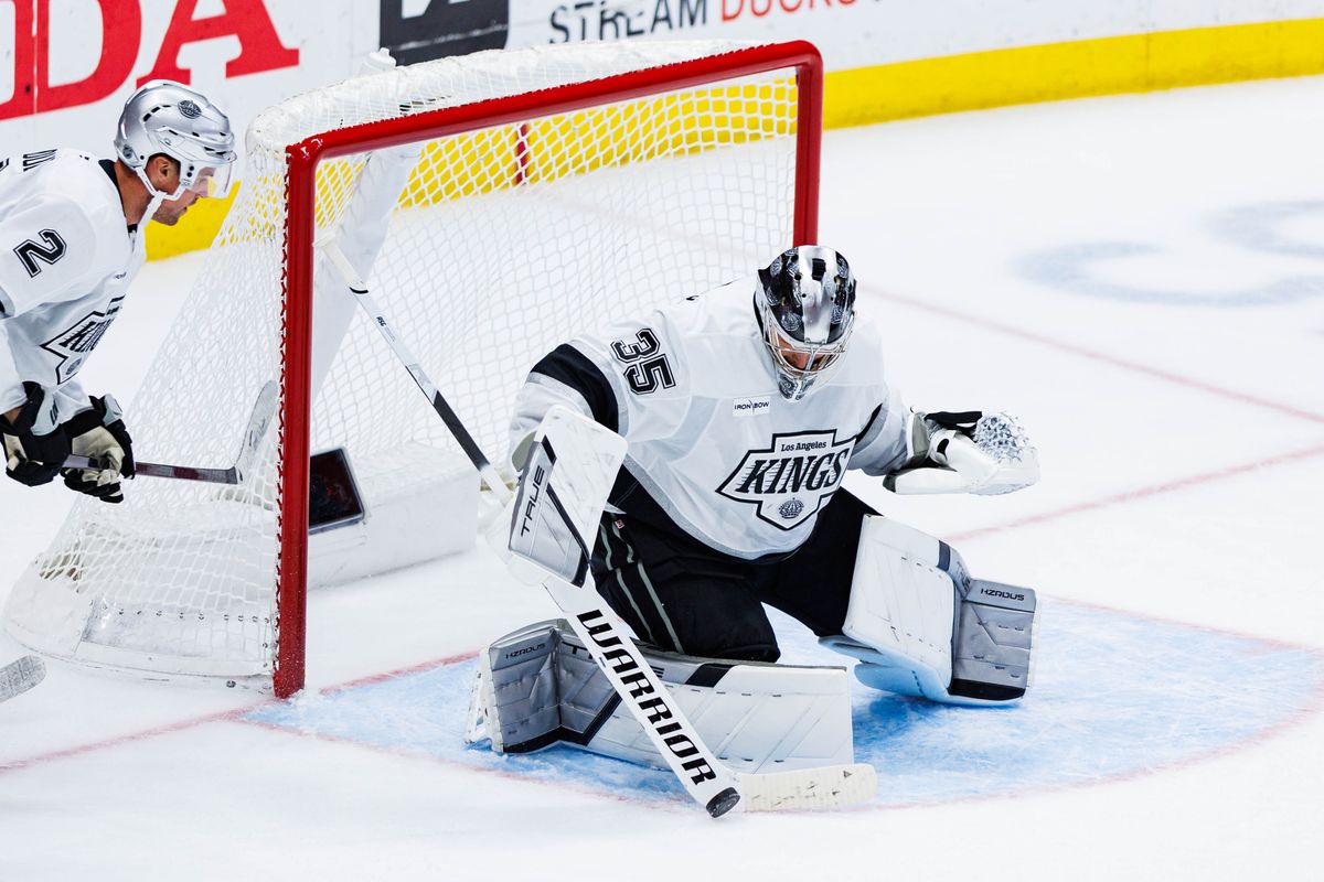 Los Angeles Kings goalie Darcy Kuemper (35) records a save during an NHL game against the Anaheim Ducks on November 28, 2025 in Anaheim, Calif.